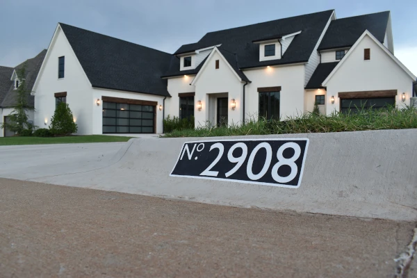 Freshly painted curb numbers