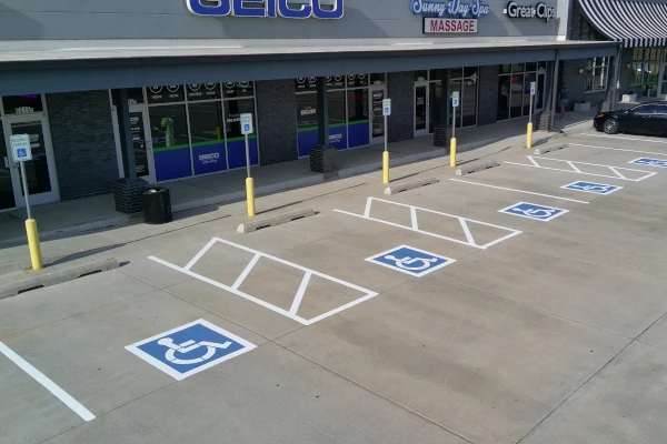 Wheelstops installed and fresh parking lot striping